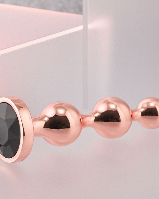 Gender X Gold Digger - Small Rose Gold Butt Plug with Black Gem Base