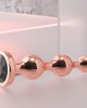 Gender X Gold Digger - Medium Rose Gold Butt Plug with Black Gem Base